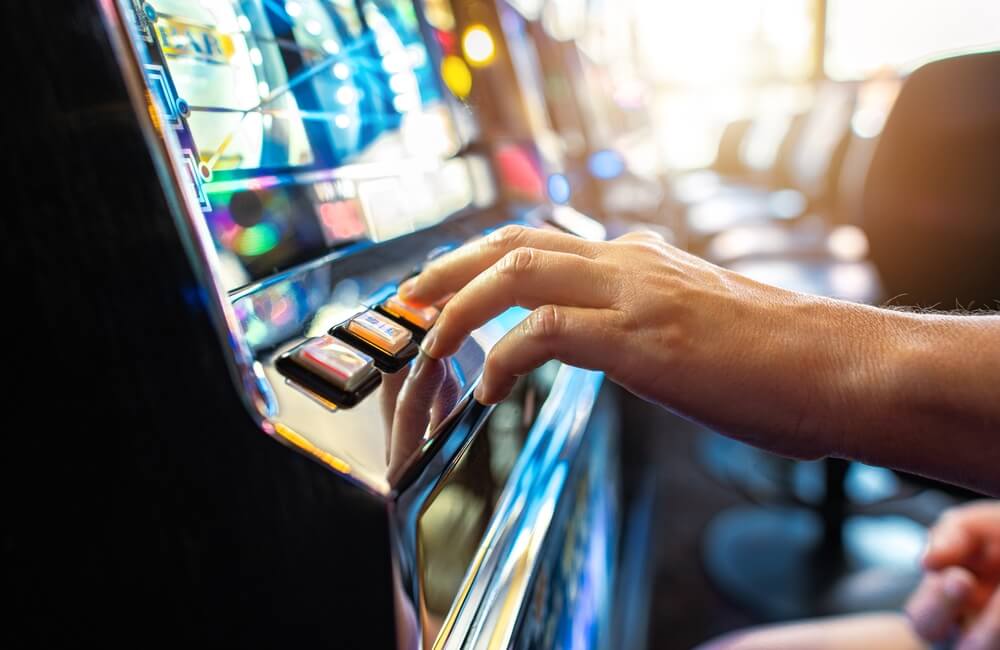 Woman,Playing,Classic,Slot,Machine,Inside,Las,Vegas,Casino.,One