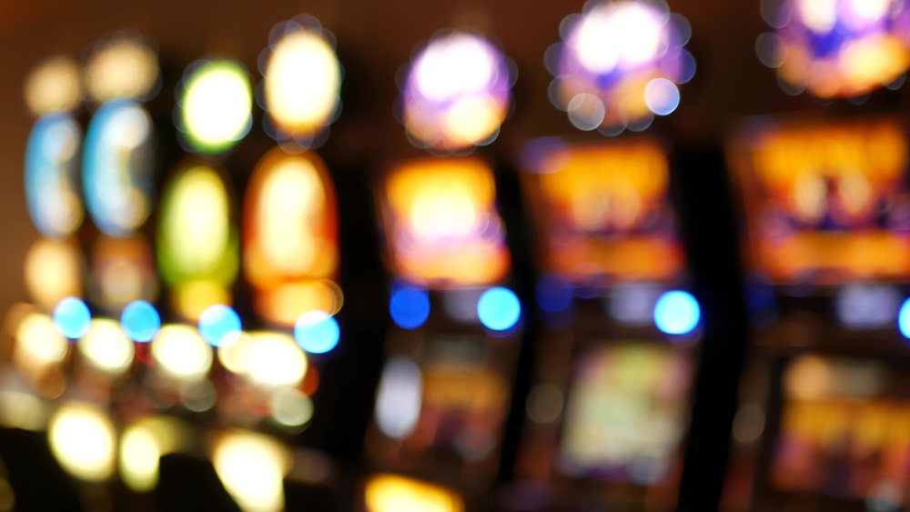 Defocused,Slot,Machines,Glow,In,Casino,On,Fabulous,Las,Vegas