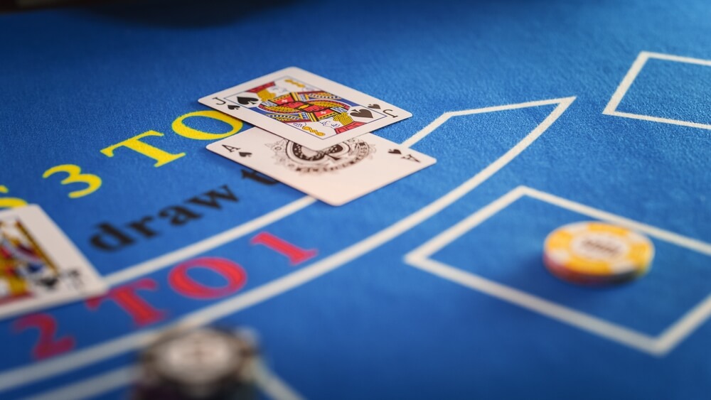 Close,Up,On,Casino,Baccarat,Gambling,Table:,Anonymous,Croupier,Dealing